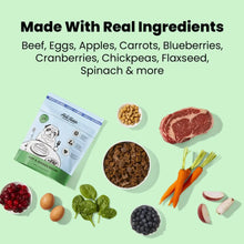 Air-dried dog food pouch with ingredient icons: beef, eggs, apples, carrots, berries, flaxseed.