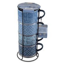 Blue patterned stoneware stacking mugs on wire rack with box
