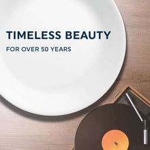 White glass dinner plate with 'TIMELESS BEAUTY FOR OVER 50 YEARS' text