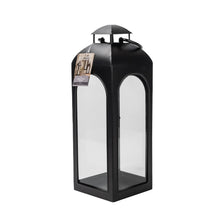 Black metal lantern candle holder with clear glass panels and side door detail