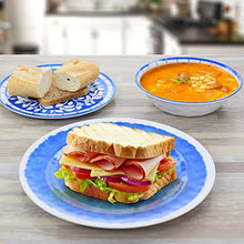 Blue floral melamine plates with sandwich and soup bowl, set for serving