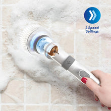 Electric spin scrub brush cleaning tile with foamy bubbles and rotating brush head