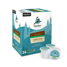 Caribou Blend medium roast decaf K-Cup pods package with pod, 24-count