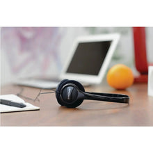 Black Koss on-ear headphones lying flat with cushioned ear pads