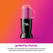 Black personal blender with clear blending cup filled with purple smoothie