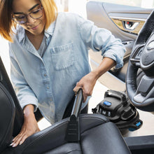Hart vacuum nozzle attachment for car upholstery connected to the canister
