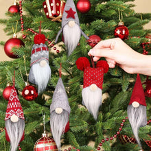 Plush gnome ornament set of 6 on a Christmas tree, red and gray hats with beards