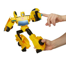 Yellow and blue transforming action figure with wing arms and black tire details.