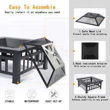 Black fire pit table frame with mesh spark lid, shown in an angled setup