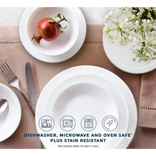 White glass dinnerware set with bowls and plates for serving