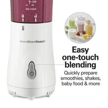 White personal blender base with power button and blending jar showing liquid level markings