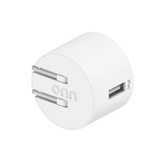 White round USB-A wall charger with single port and logo on face.