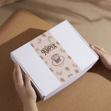 KupiX K-Cup coffee sampler box held in hands