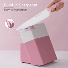 Kitchen knife set with built-in sharpener, pink block and white stainless blades