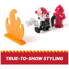 Paw Patrol fire rescue dog figure with orange flame base and red fire hydrant