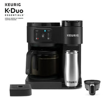 Black Keurig dual coffee maker with carafe and K-cup pod holder