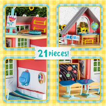 Miniature dollhouse play set showing interior rooms with accessories and furniture