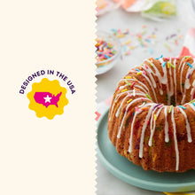 Non-stick bundt cake pan, shown with a decorated bundt cake on a plate