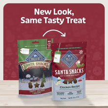 Two Santa Snacks dog treat packages, chicken recipe, holiday themed.
