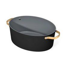 Electric multi-cooker pot with black base, domed lid, gold side handles