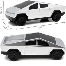 RC pickup truck model with size markings; gray body and large black off-road tires.