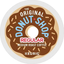 Round coffee label reading Donut Shop Coffee Regular medium roast, Keurig