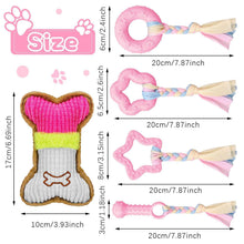 Pink dog chew toys and a plush bone toy shown with size arrows and measurements