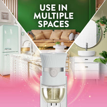 Air Wick plug-in scented oil refill device with clear oil reservoir