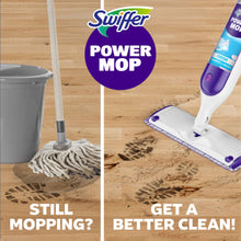 Power mop on floor with purple scrubbing head and striped cleaning pad