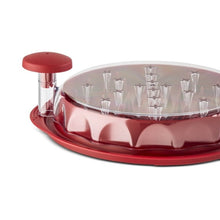 Red chicken shredder clear lid close-up with side knob and metal pin spikes