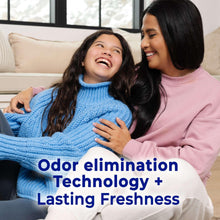 Liquid fabric softener ad with two women cuddling on a couch