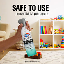 Clorox PURE daily air spray bottle held and aimed with gray trigger