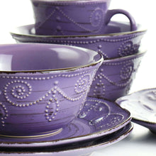 Purple stoneware mug and bowl with beaded embossed pattern and loop handle