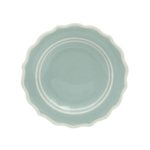 Ceramic dinner plate in sage blue with scalloped rim and concentric ring lines