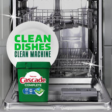 Cascade Complete dishwasher detergent pods container beside empty dishwasher rack