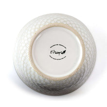 Elama ivory ceramic bowl underside with lattice pattern and brand logo
