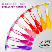 Women’s multi-blade razor handles in assorted bright colors