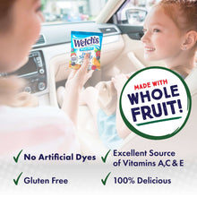 Welch's mixed fruit fruit snacks pouch held in car with whole fruit made with badge