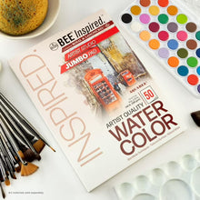 Watercolor paper jumbo pad with 50 sheets next to watercolor palette