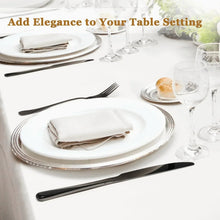 Black flatware set with dinner fork and knife, mirror-polished stainless steel utensils.