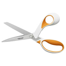 White and orange fabric scissors with pointed blades and loop handle