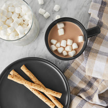 Matte black stoneware mug viewed from above with marshmallows