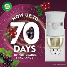 Air Wick plug-in scented oil warmer with clear refill reservoir