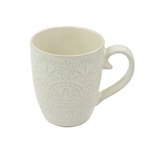 Stoneware coffee mug with embossed floral lace pattern and side handle, off-white
