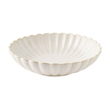Cream stoneware dinner bowl with scalloped ridged edge