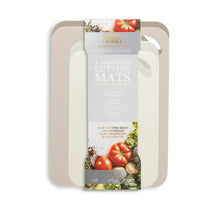 4-piece cream poly cutting mats retail package with visible mat shapes