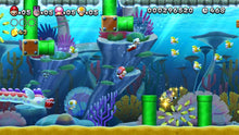 Underwater platform game scene with Mario swimming among colorful plants and bubbles