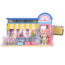 Flower shop dollhouse playset in clear box with pink shopfront and small bear figure