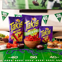 Takis Fuego chips multipack display with several purple 9.9 oz bags and bowls