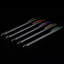 Five black-toned EnerGel Kuro gel pens with pointed nibs and varied ink colors